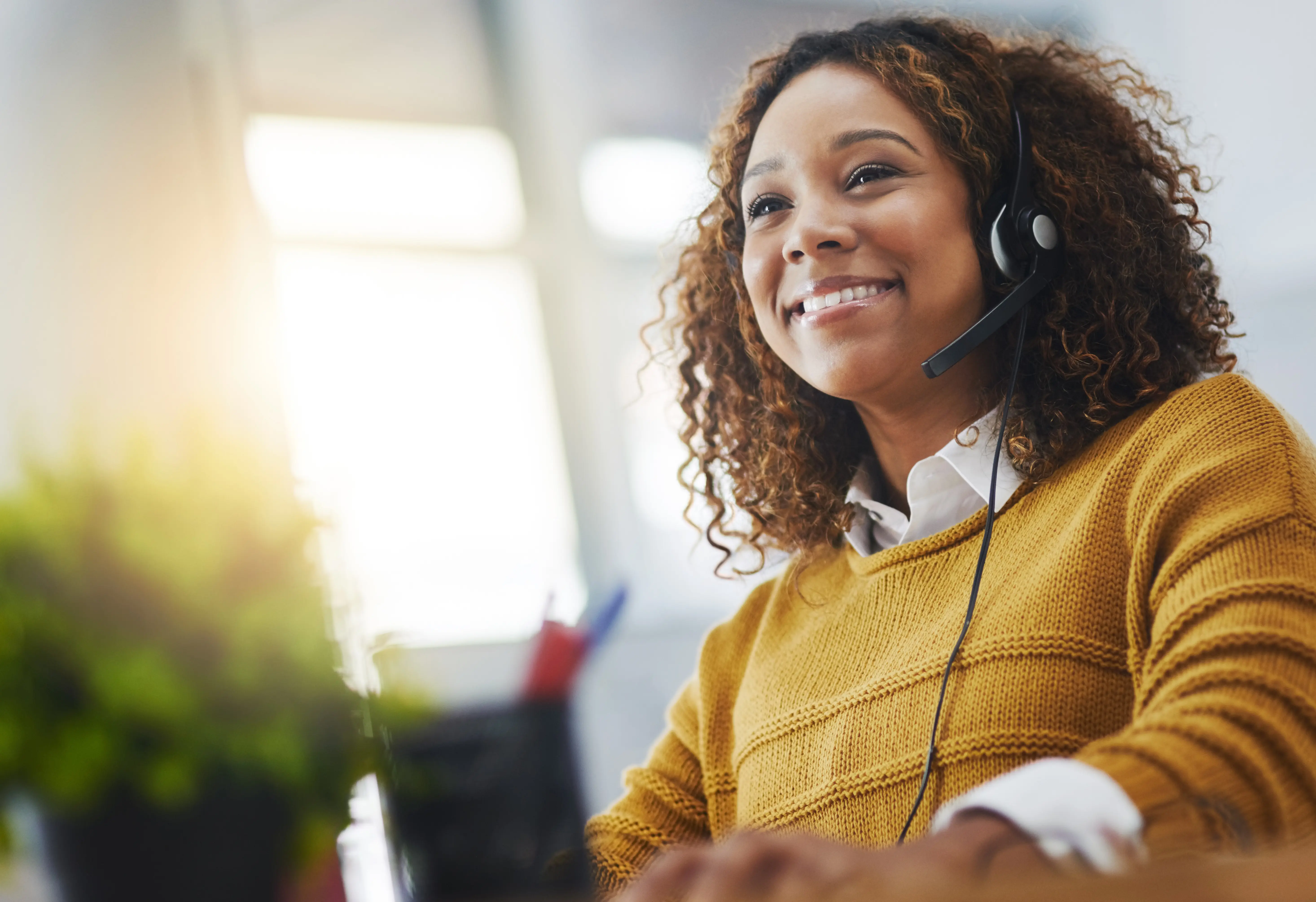 Customer service representative wearing a headset